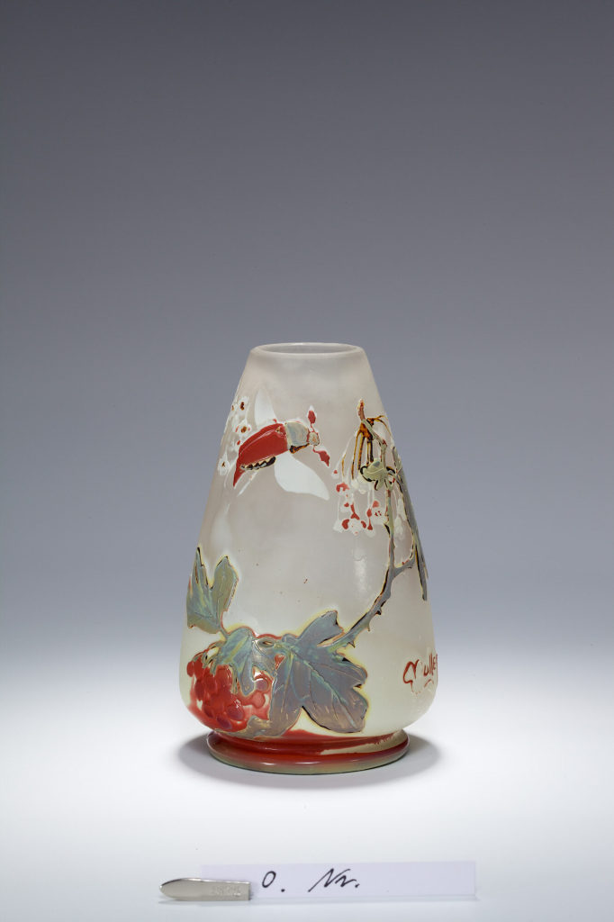 Vase mit Maikäfer