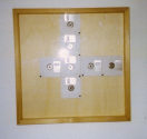 Andrea Natterer: MEDIENOBJEKT III,  2002, 50x50cm, Holz, Plexiglas, Disketten