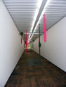 Ulrike Kessl: running clothes, 2009 (2,4 x 2, 4 x 48 m; Nylonstrumpfhosen, Drahtseil, vier  Mot ...