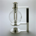 Teekanne mit Stövchen, 1990-1999, 8+1 Exemplare, Silber 925, Glas, Ebenholz, 30x30cm, montiert