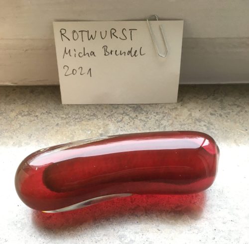 Micha Brendel (Künstler*in), Multiple "RotWurst" aus der Kunstbox "FlaschenGeist", 2021