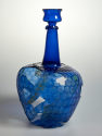 Blaue Flasche mit Wabendekor